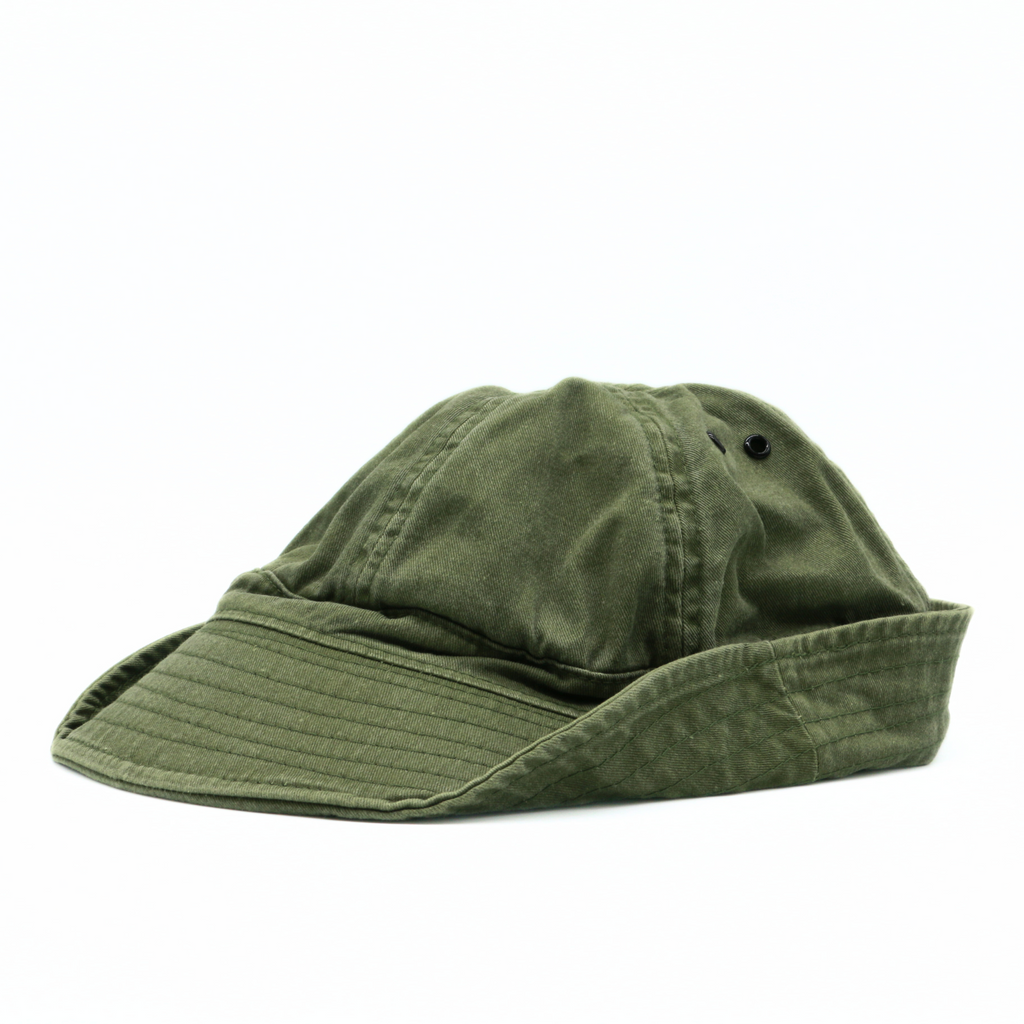 A side shot of the green field maneuver hat. 