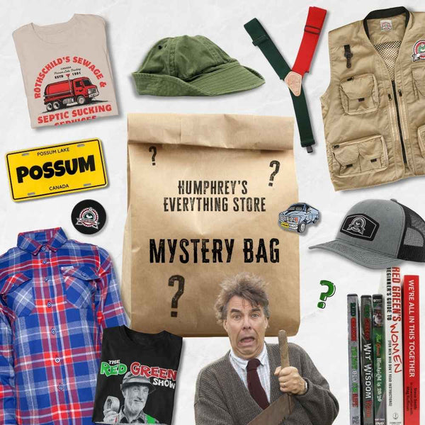 Humphrey's Everything Store Mystery Bag  surrounded by a variety of products like t-shirts, suspenders, hats, books, pins, and flannels that could be included